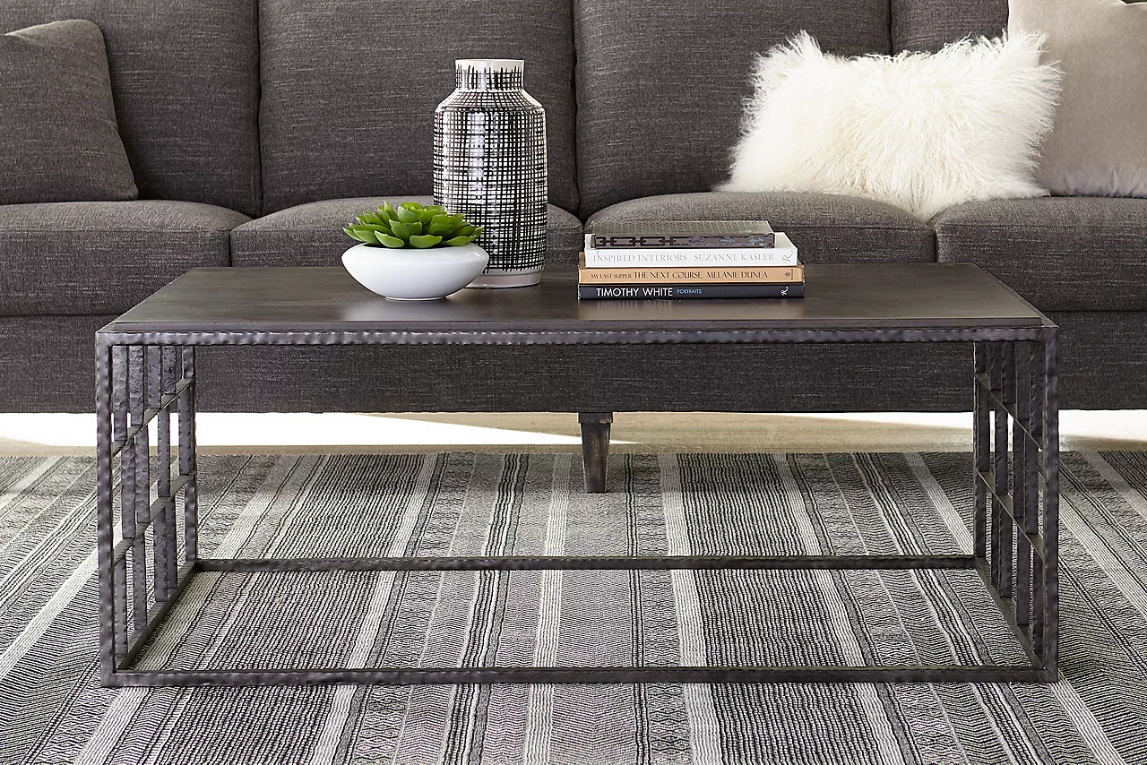 Image of a coffee table with decor of various heights